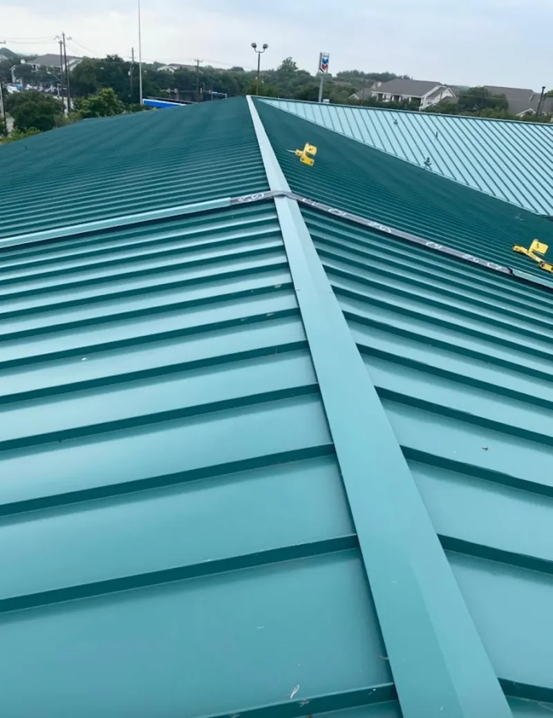 Green commercial metal roof ridge and valley for Metal Roof Repair in Linton